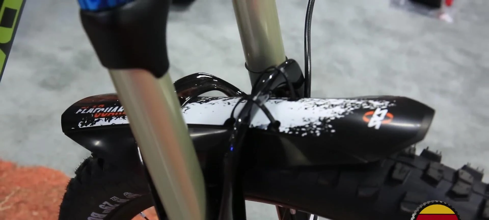 The SKS Flapguard fender shown mounted on a bike, highlighting its versatility.