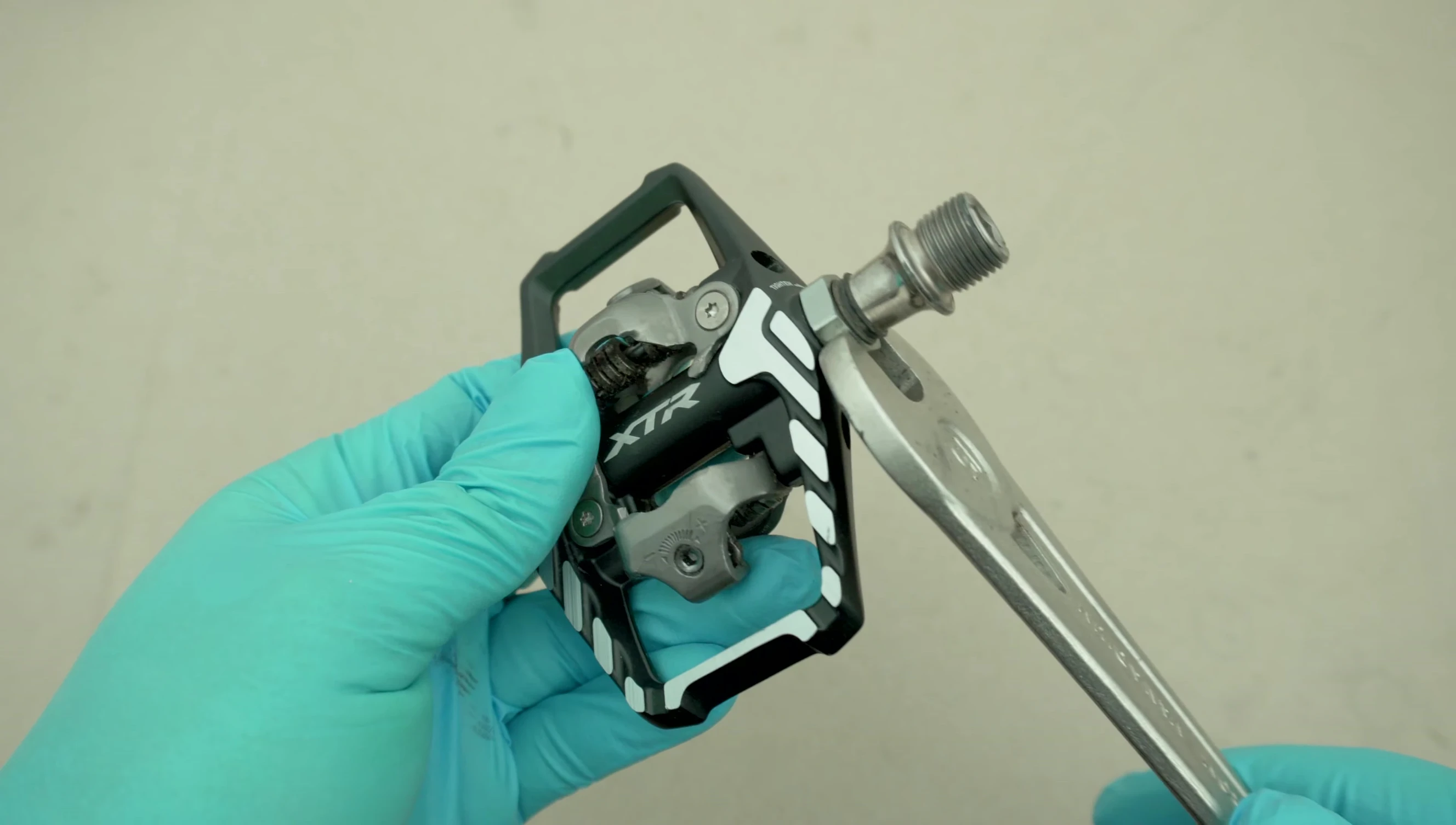 Showing the pedal disassembly process