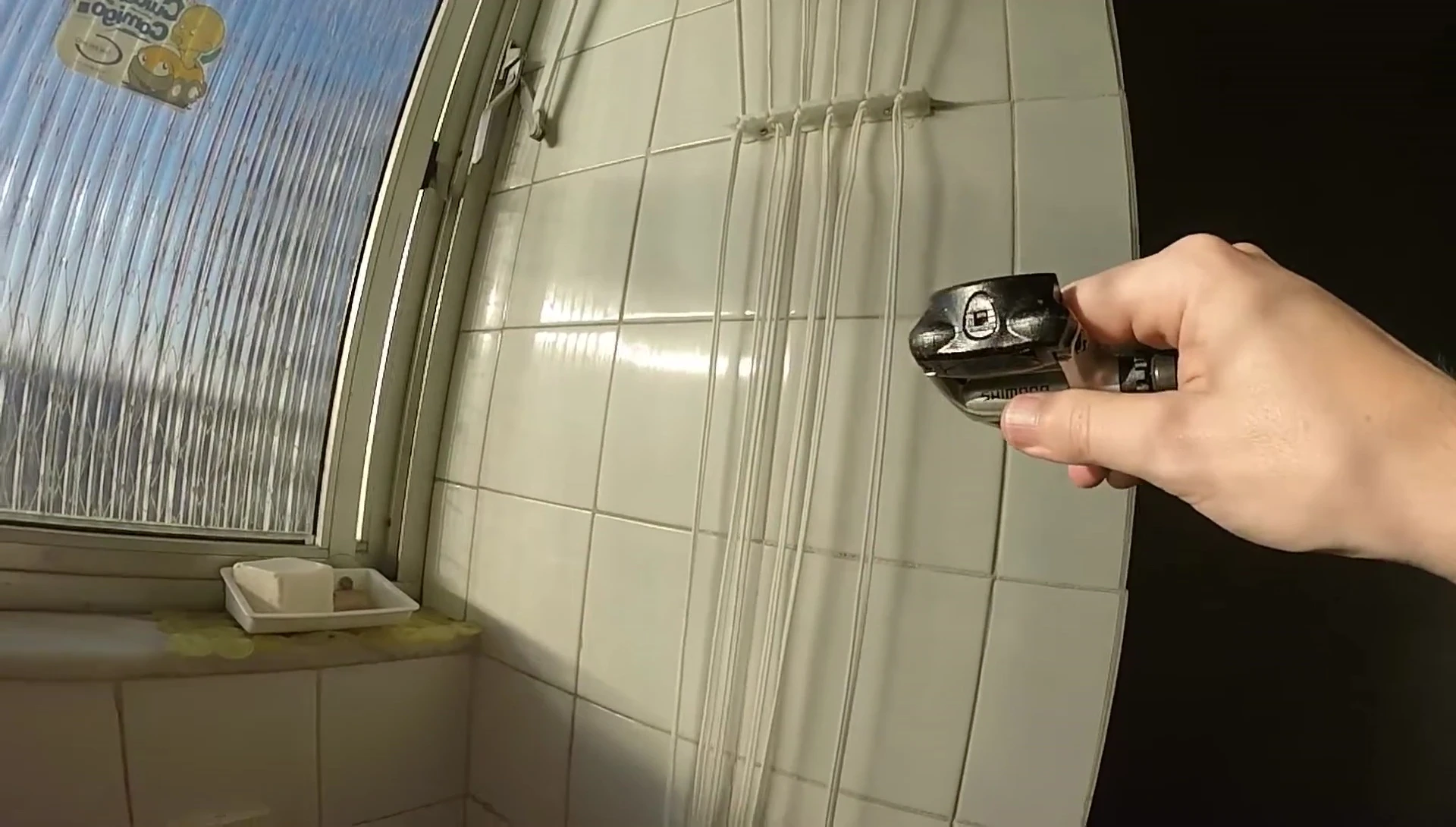 Close-up of the spring tension adjustment mechanism on the Shimano PD-R540 pedal.