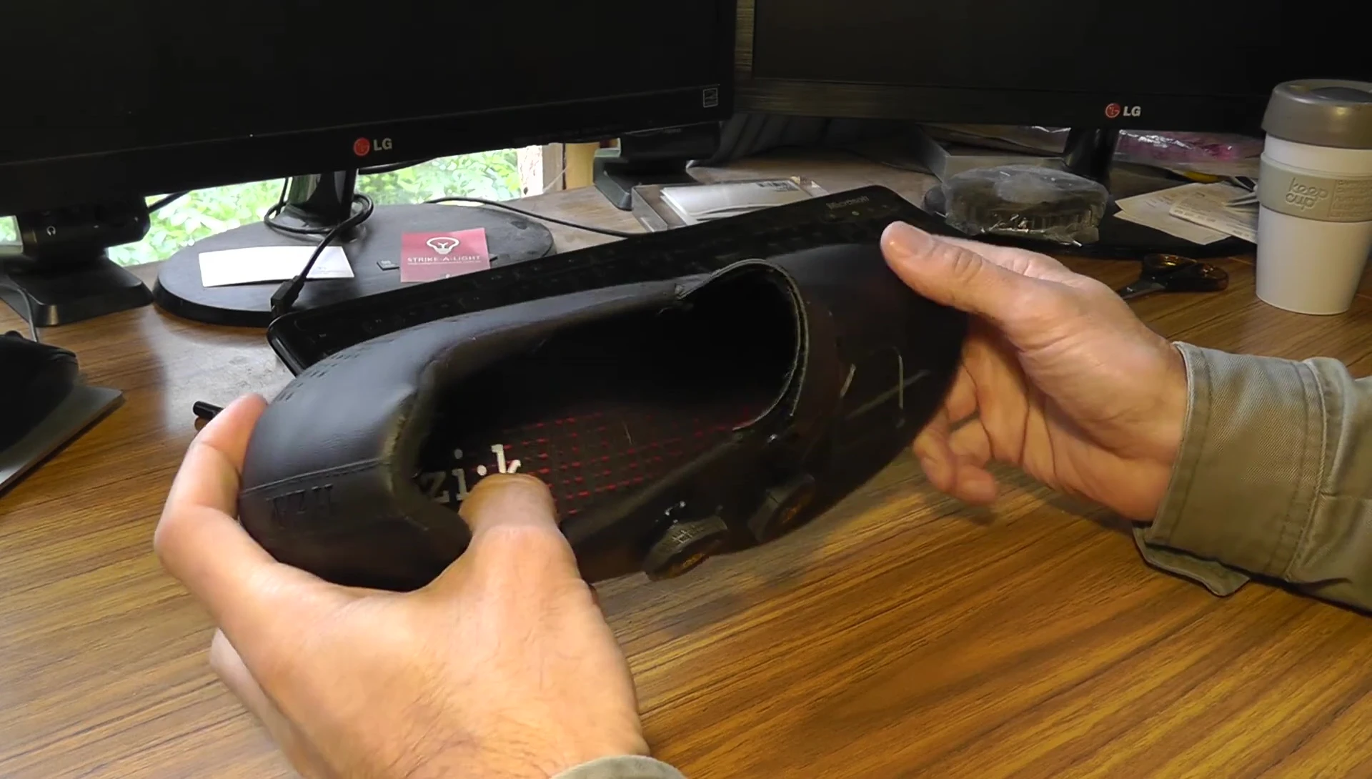The reviewer emphasizing the spacious toe box.