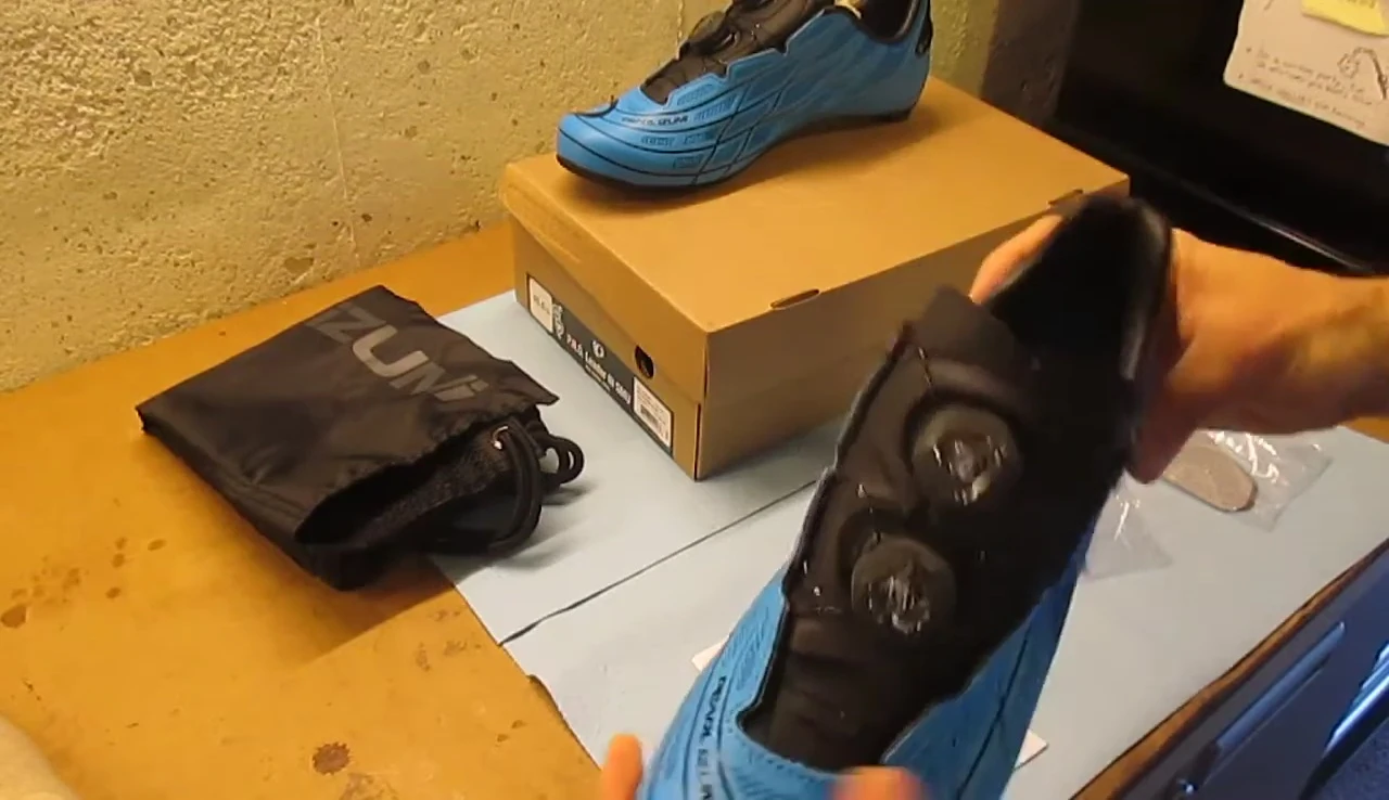 Demonstrating the stiffness of the shoe.