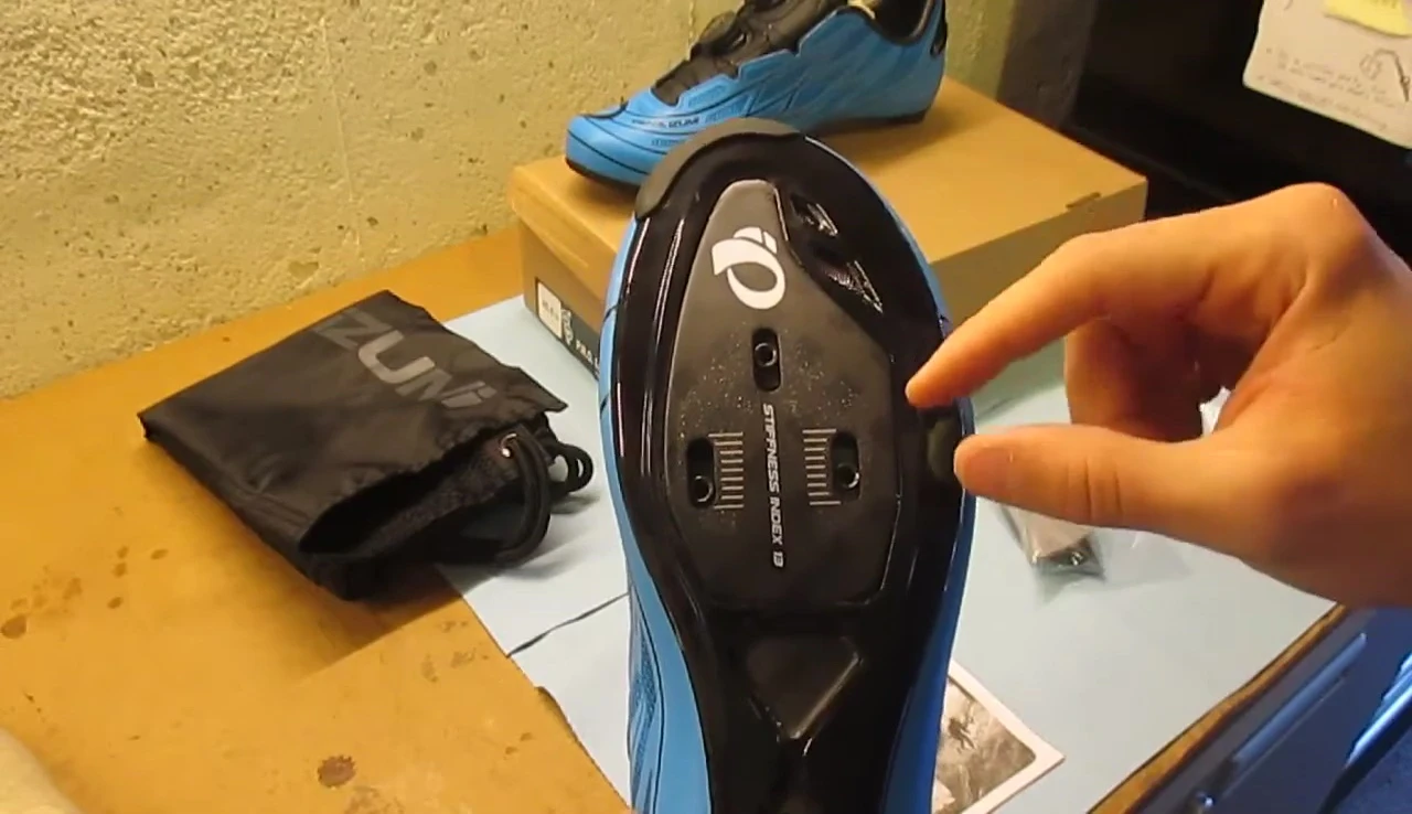 Showing the cleat mounting area with embedded adjustment slots.