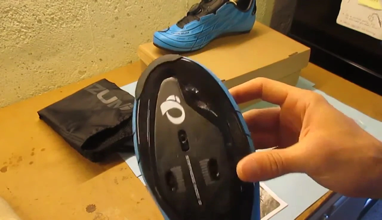 Showing ventilation holes in the shoe.