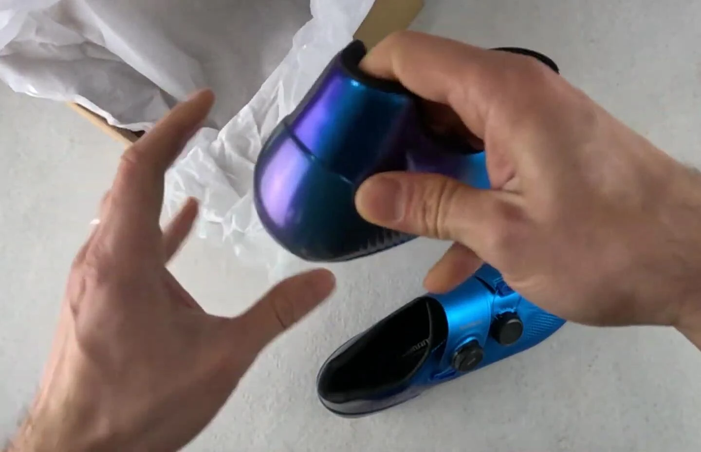 The blue Shimano S-PHYRE RC903 shoes
