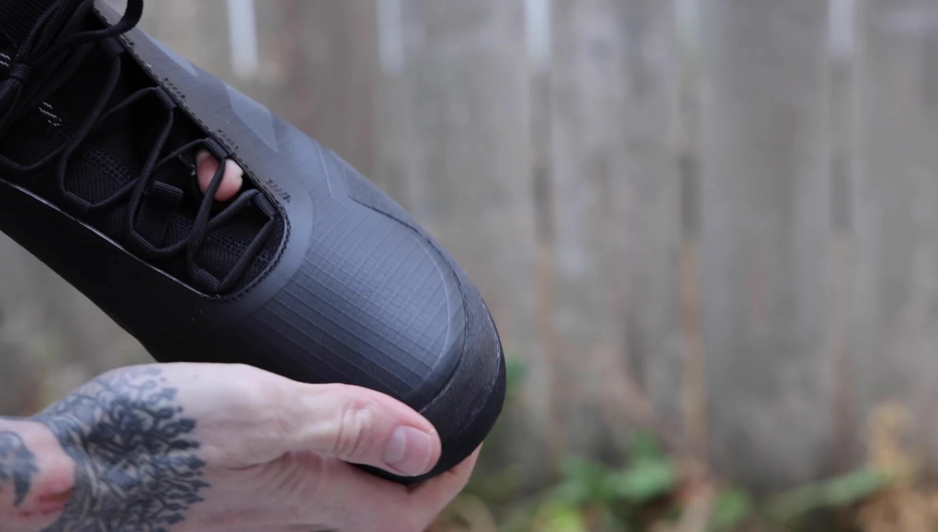 View of the outsole highlighting the TPU pods and carbon fiber.