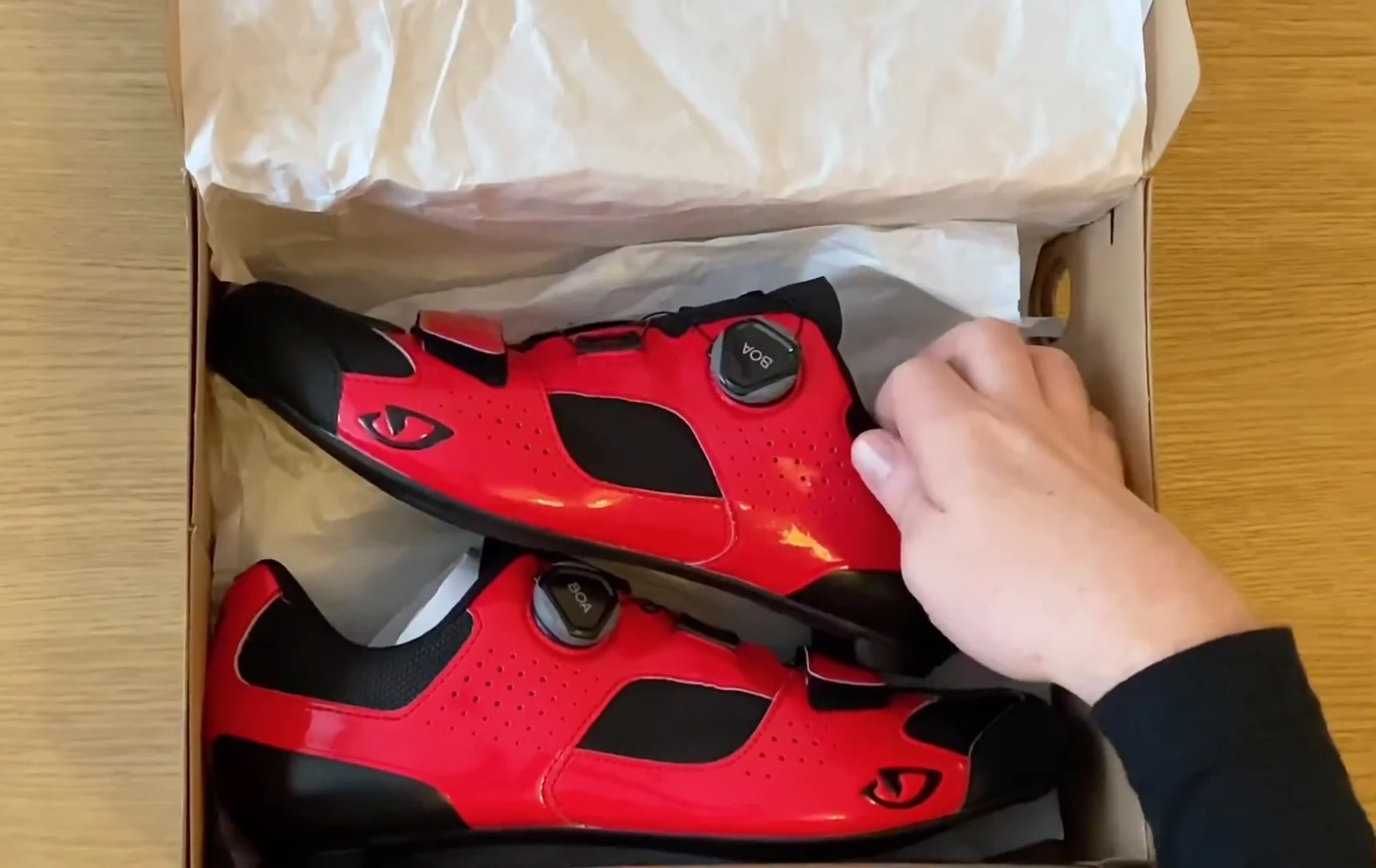 The speaker holding the Giro Trans Boa shoes