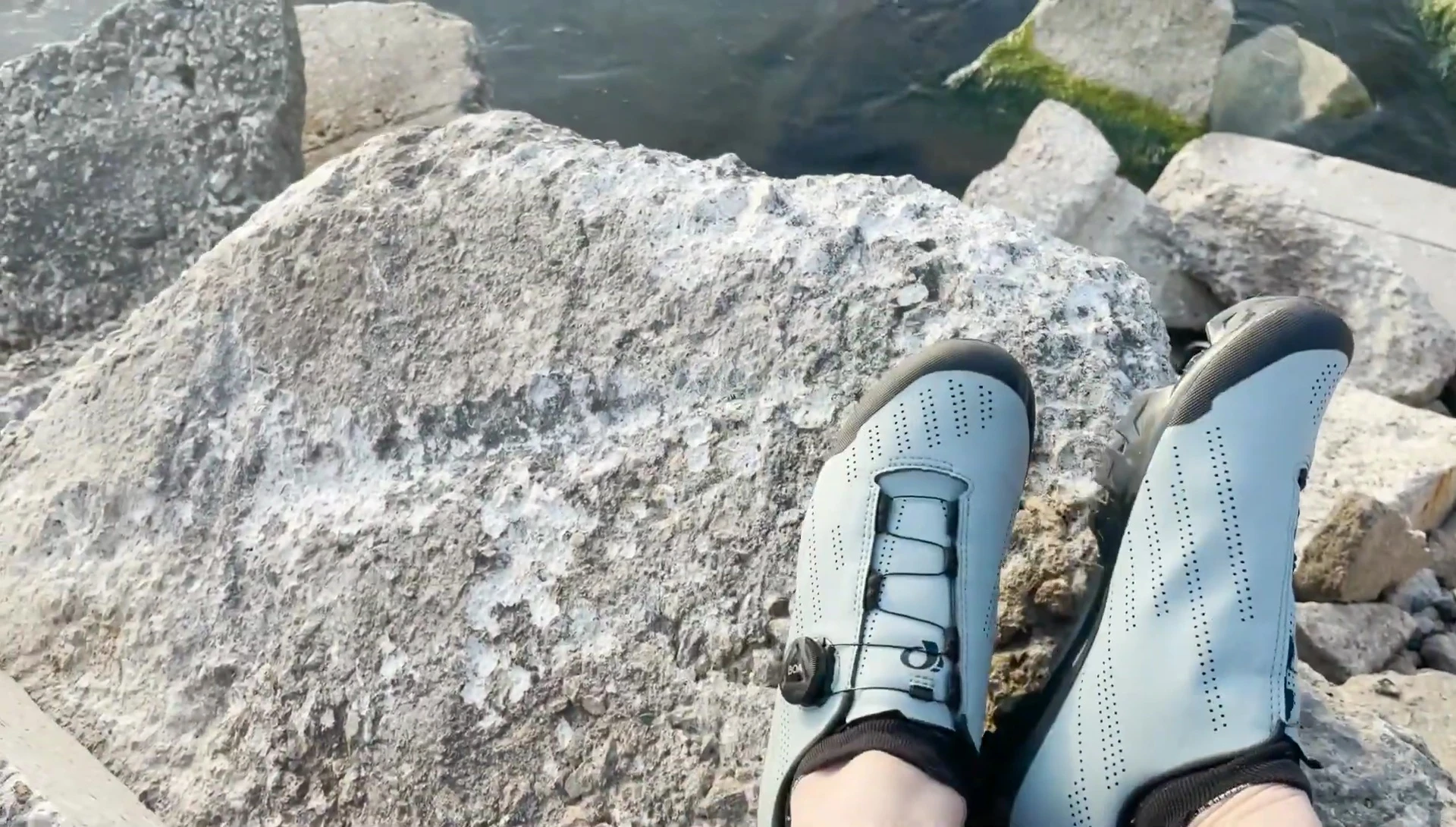 Image showcasing the perforated synthetic upper and toe bumper of the shoe.