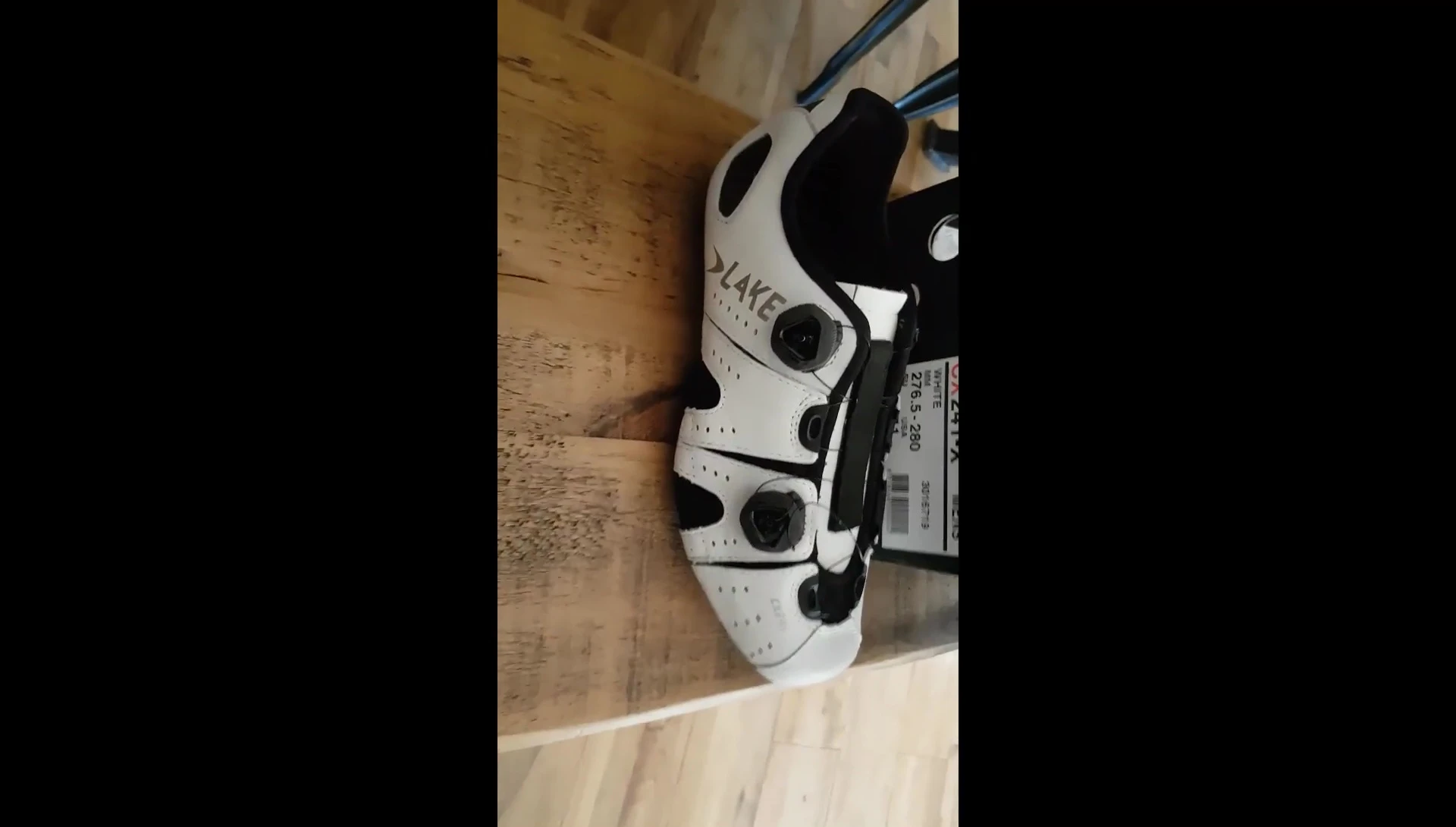 Final shot of the reviewer holding the shoes.