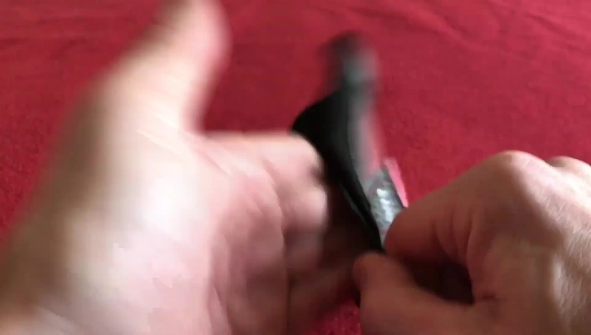 The reviewer putting on the gloves, highlighting the snug fit