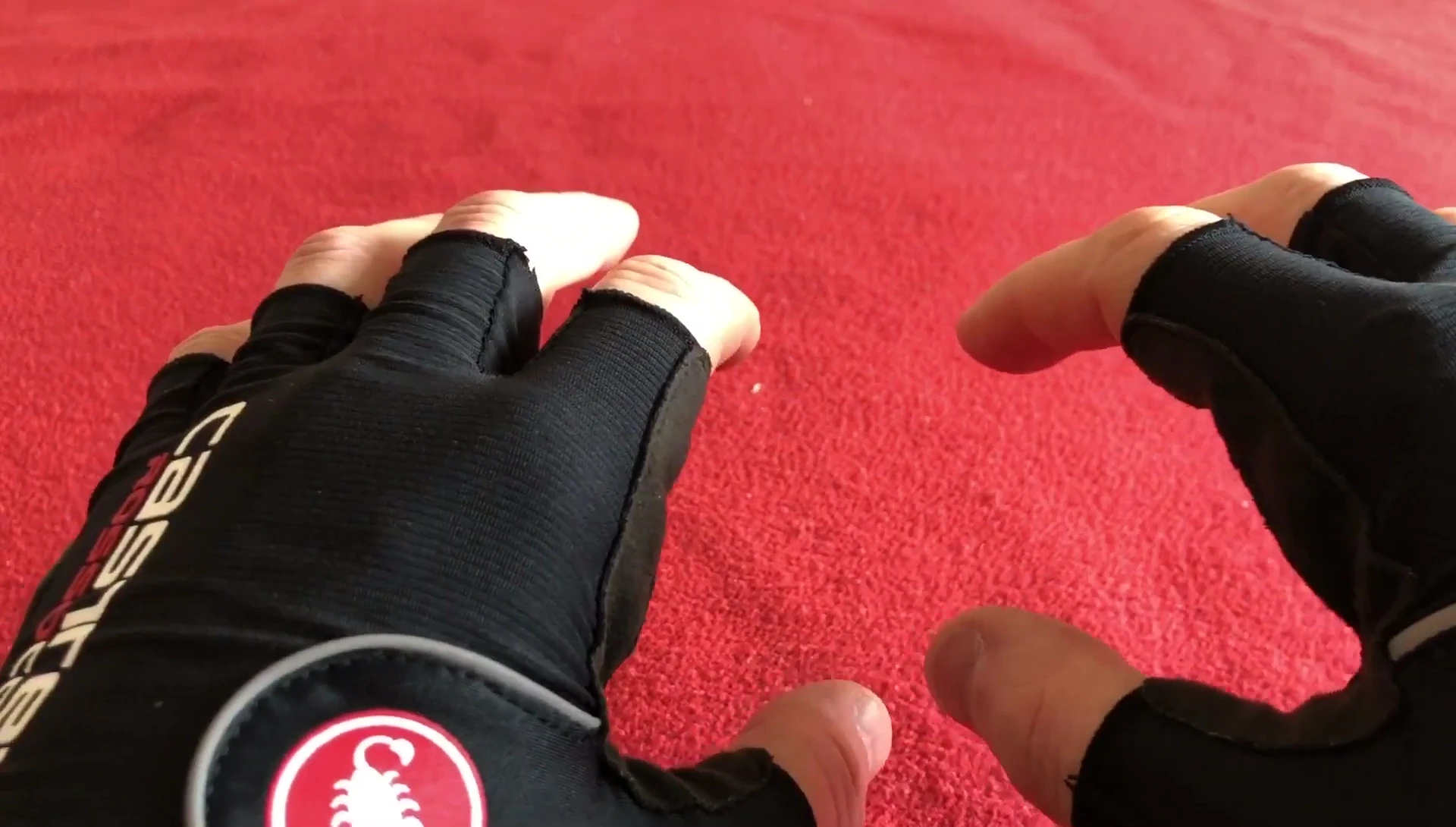 Close-up shot of the gloves on the hands, showing the fit