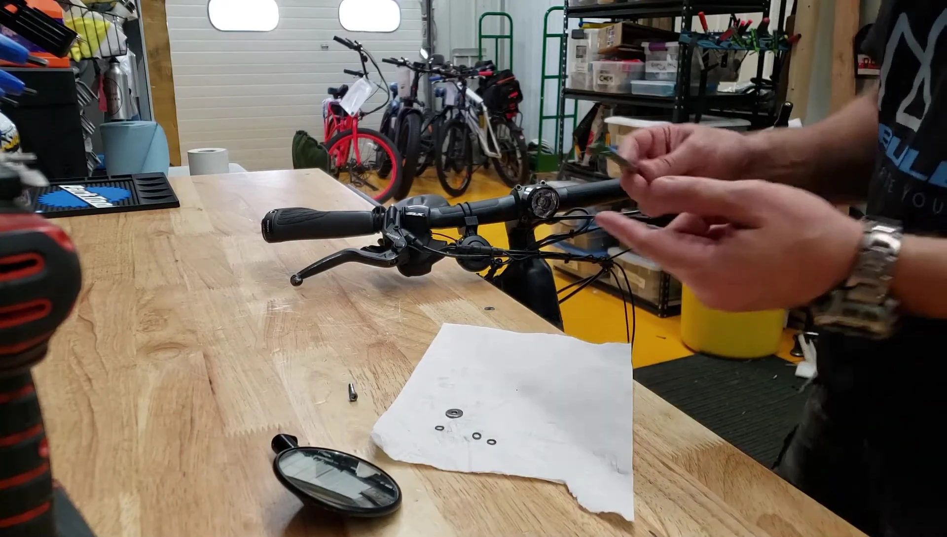 Applying a thin film of grease to the washers