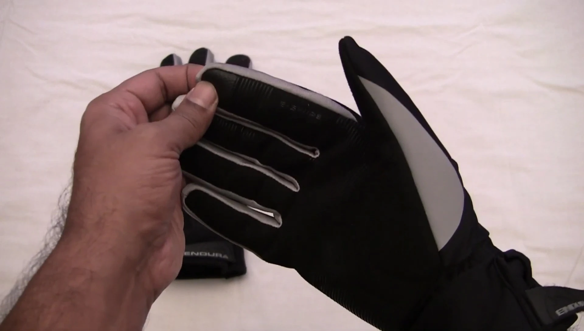 The reviewer discusses the importance of fingertip clearance.