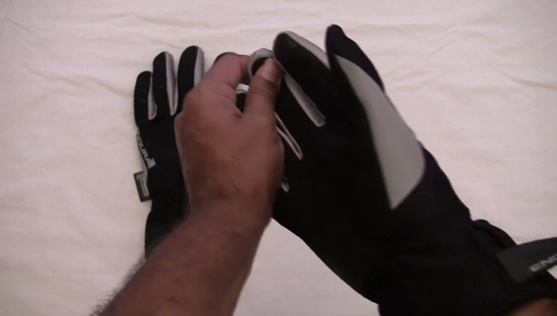 The reviewer shares their experience riding in rain and hail.