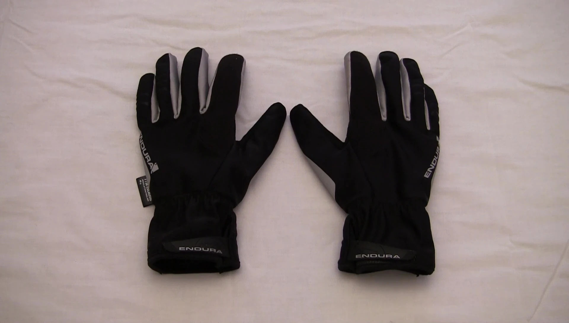Close-up of the Endura Deluge 2 gloves in hand.
