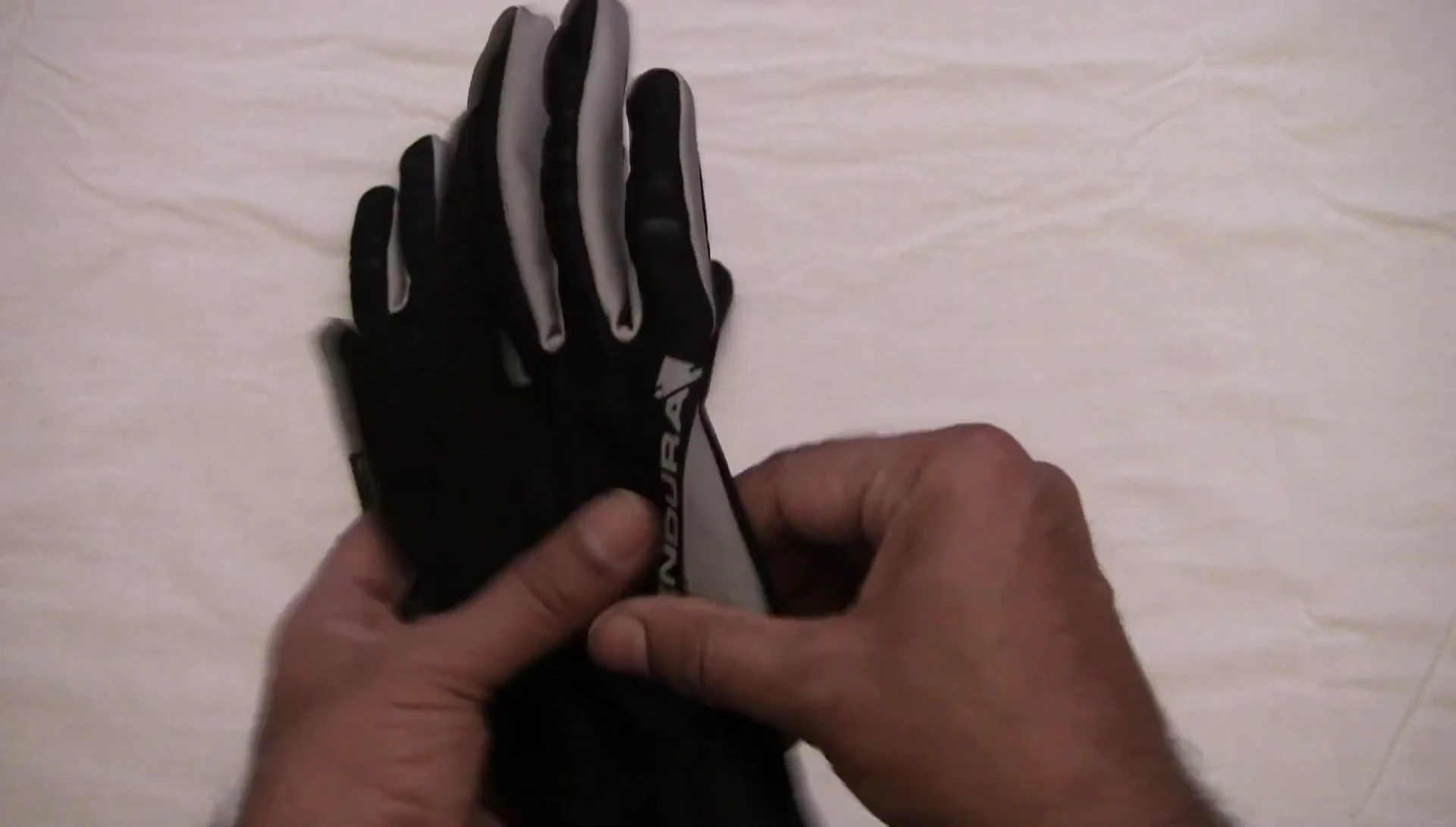 Showcase of the reflective elements on the gloves.