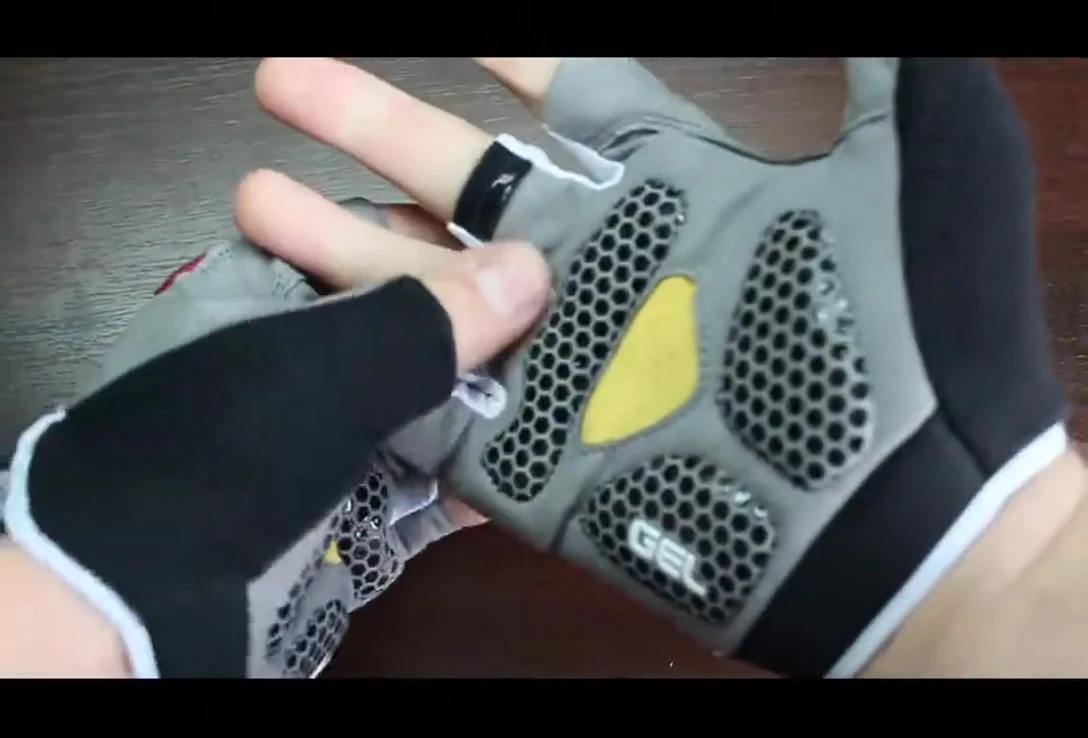 Shot emphasizing the stitching quality of the gloves.