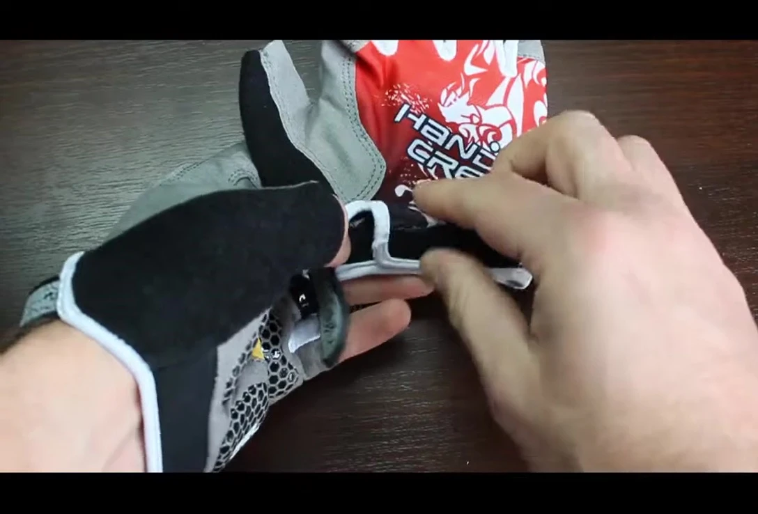 A shot of the reviewer holding the gloves, emphasizing the overall look and feel.