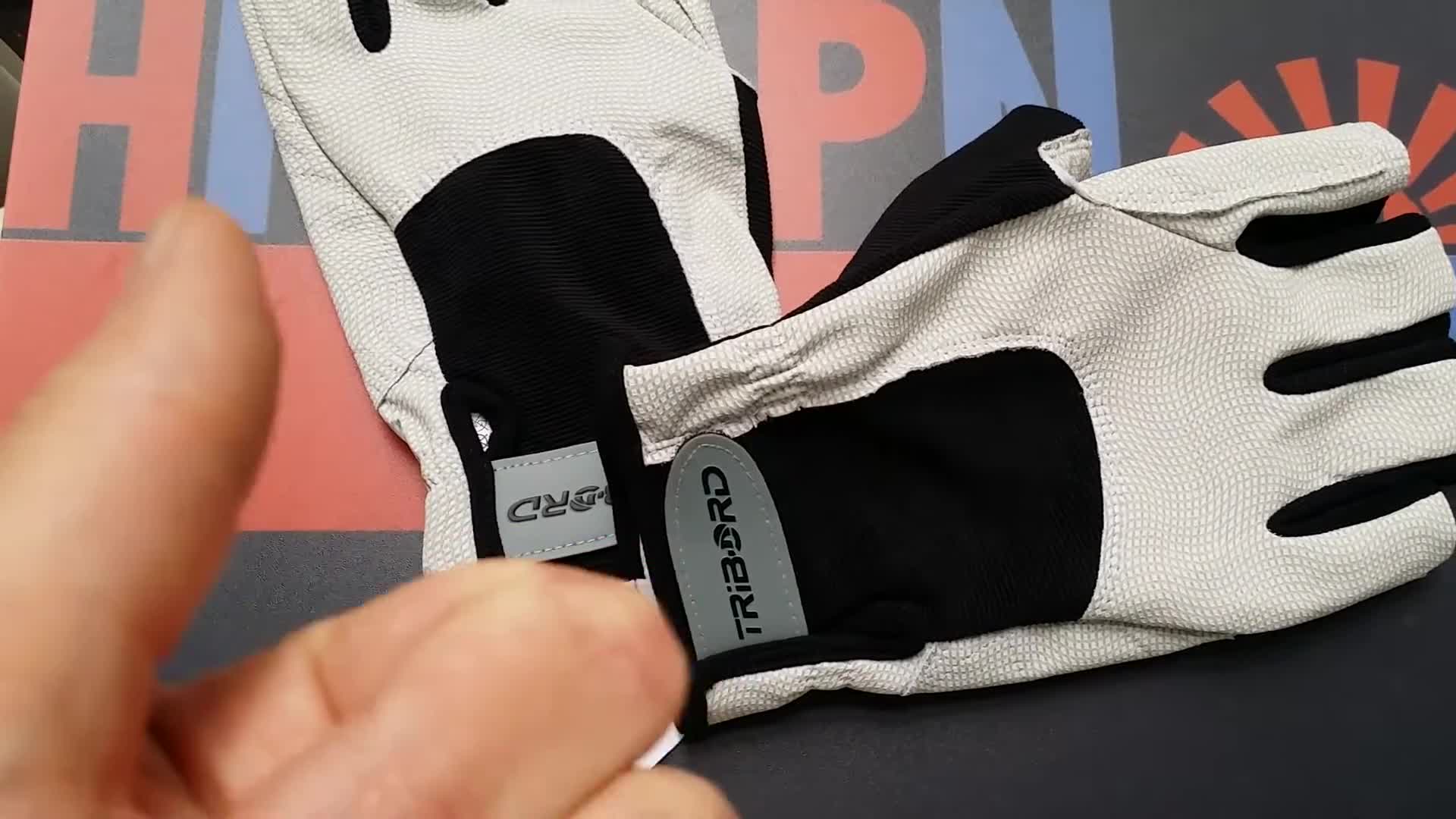 Focus on the fingerless design of the gloves.