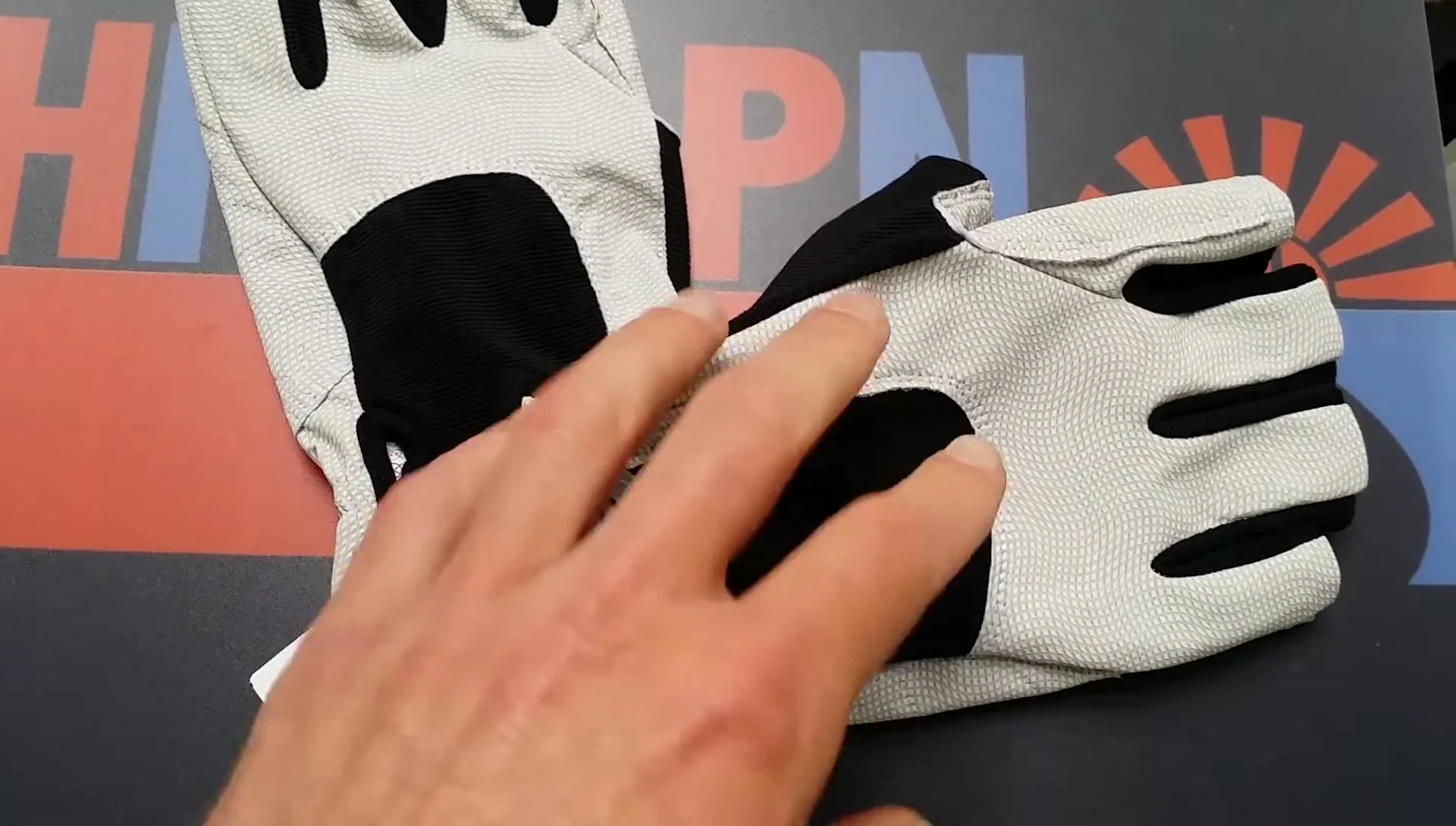View showcasing the palm area of the gloves, emphasizing the ROM.