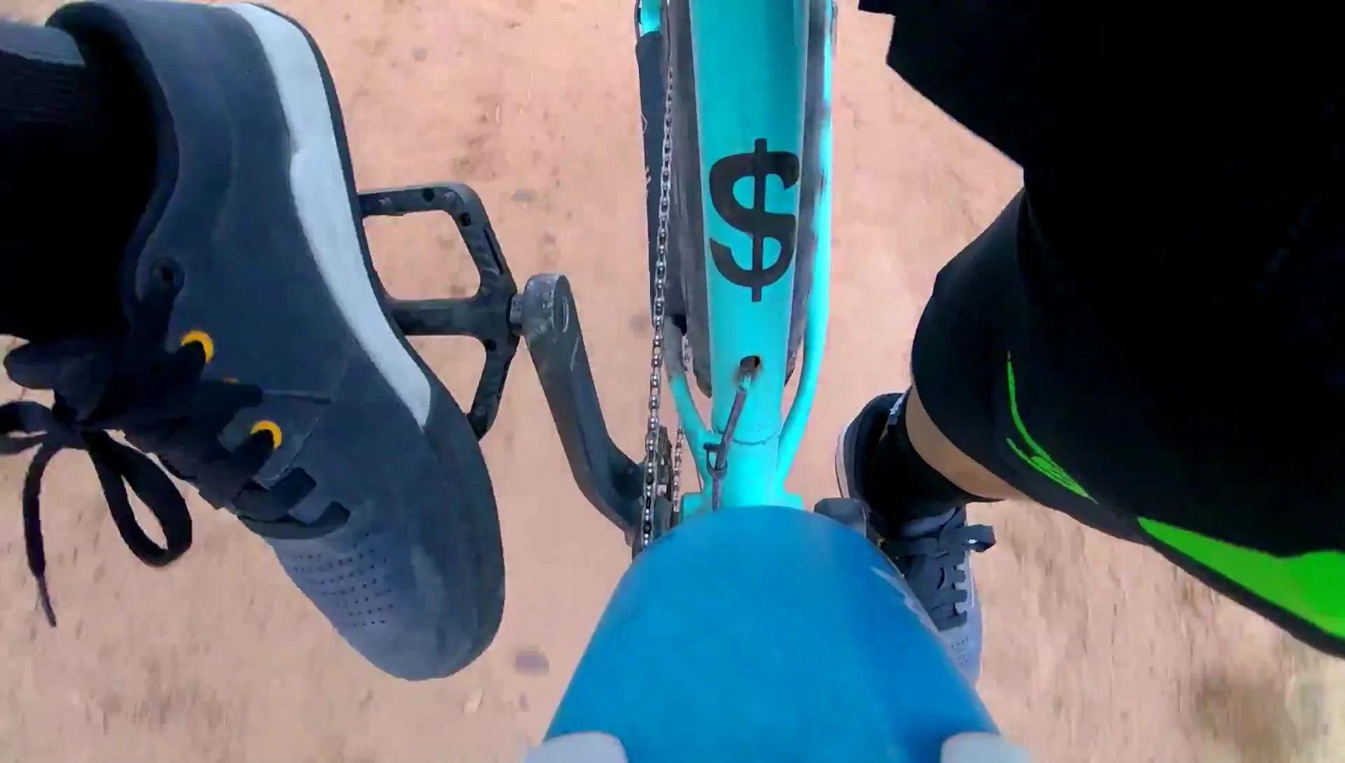 Rider demonstrating foot placement on OneUp pedal