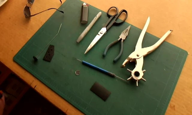 Applying glue to secure the parts.
