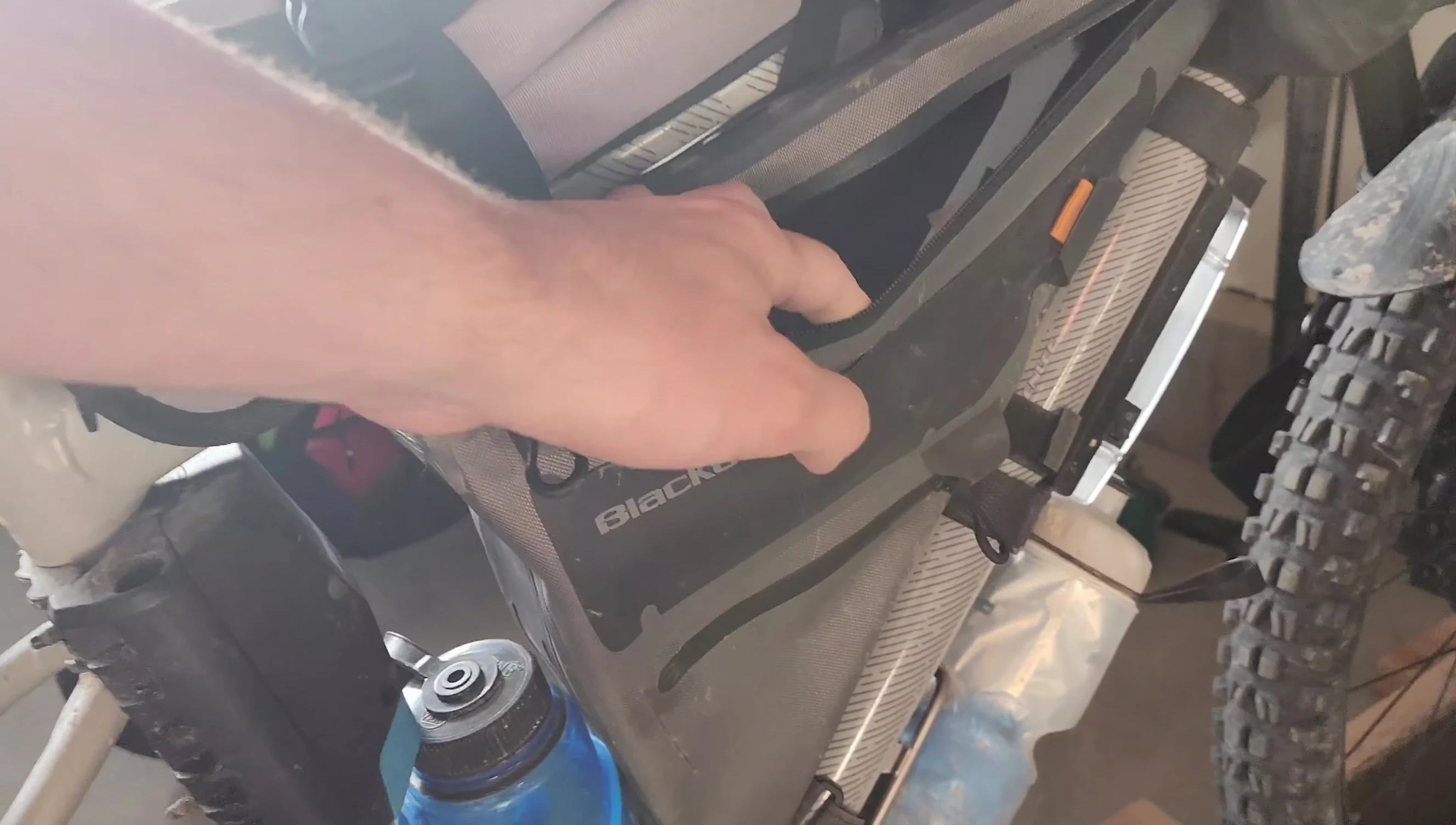 Close-up of the frame bag with various items packed inside