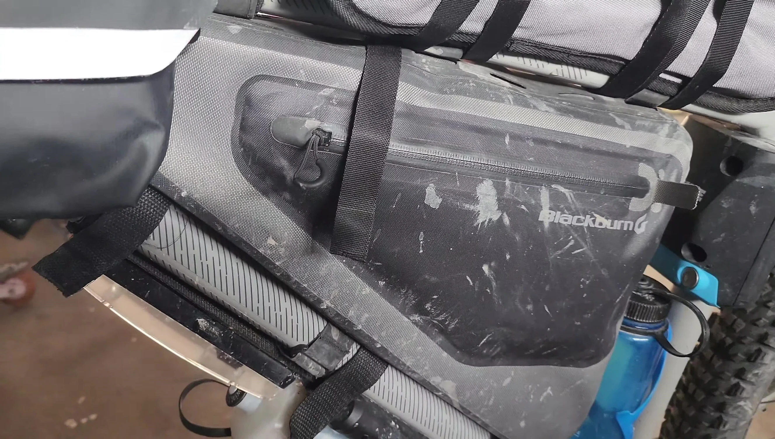 The frame bag showing its material and zippers