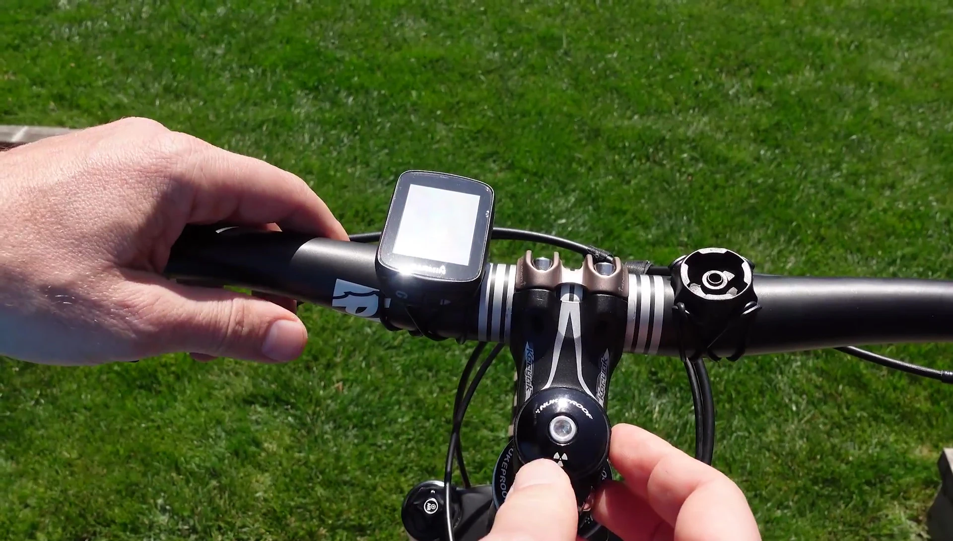 The Garmin Edge 130 Plus mounted on a handlebar.