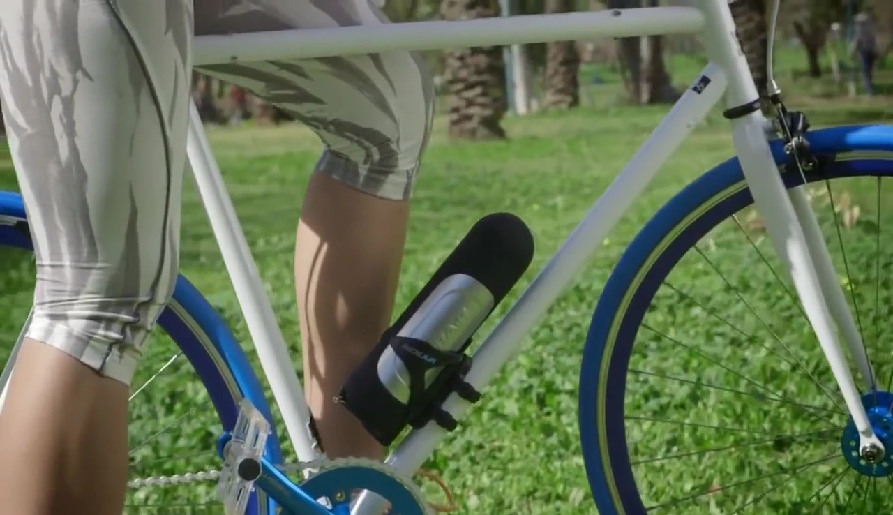 RideAir attached to a bicycle, showing its sleek and compact design.
