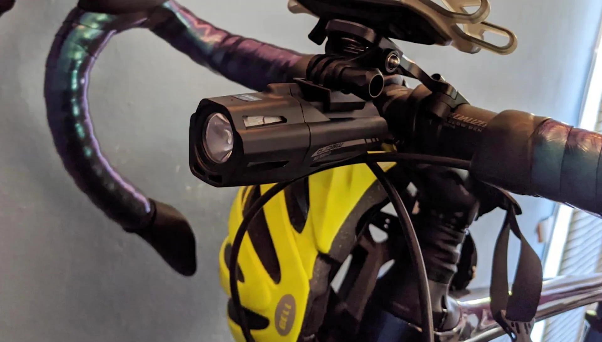 A Cygolite Metro light mounted on a bicycle, demonstrating ease of use.