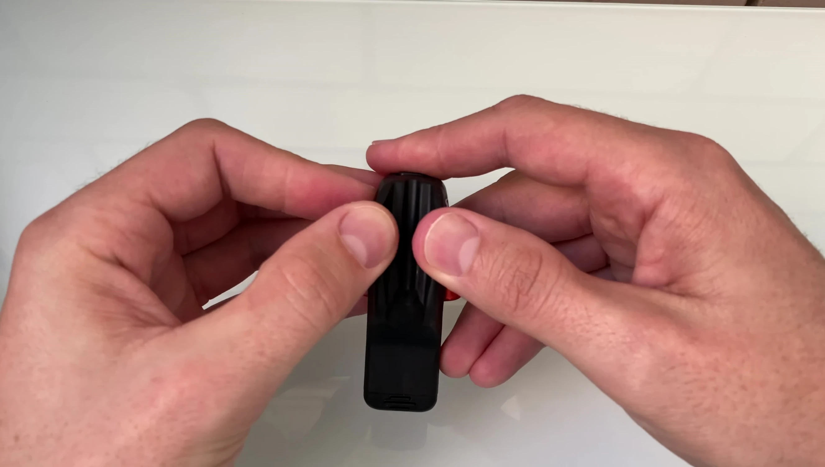 Detailed shot of the light's mounting bracket, highlighting its adjustability.