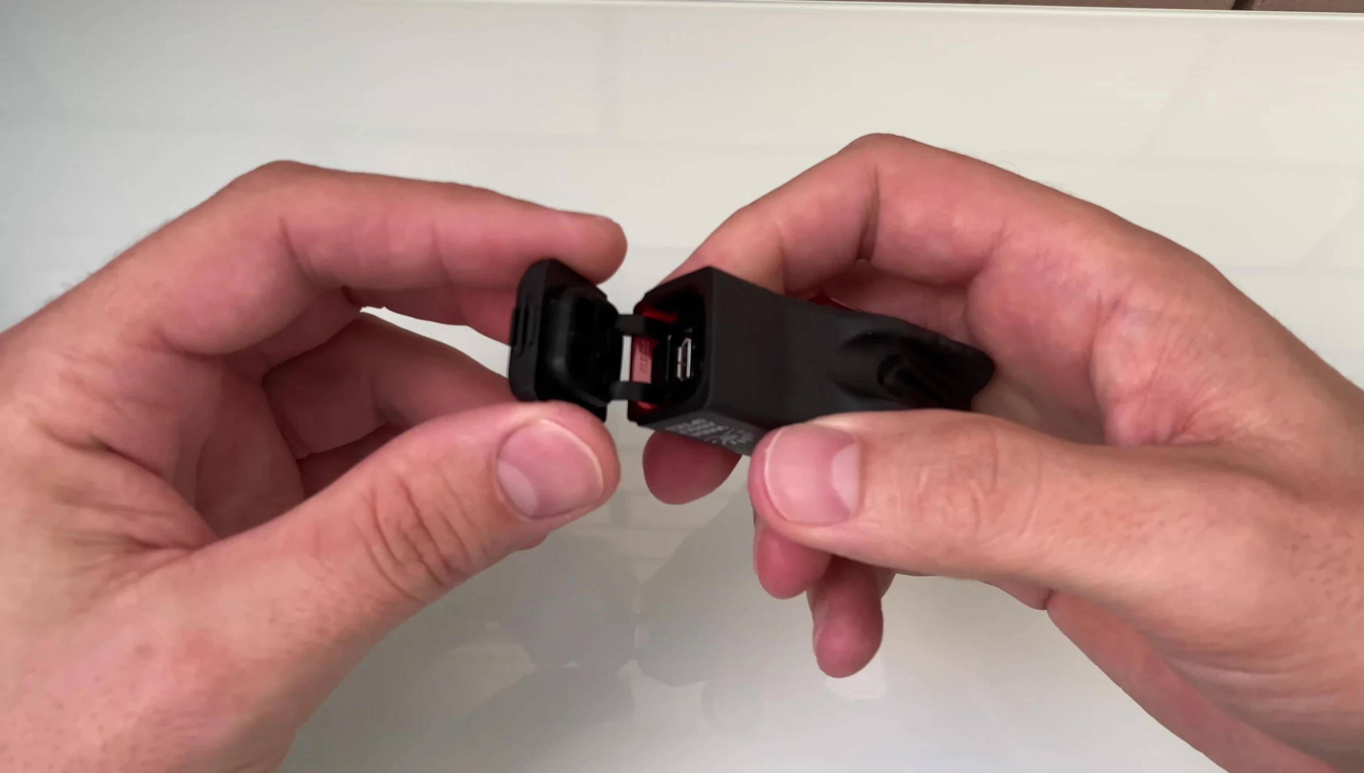 Close up of the charging port and battery indicator.