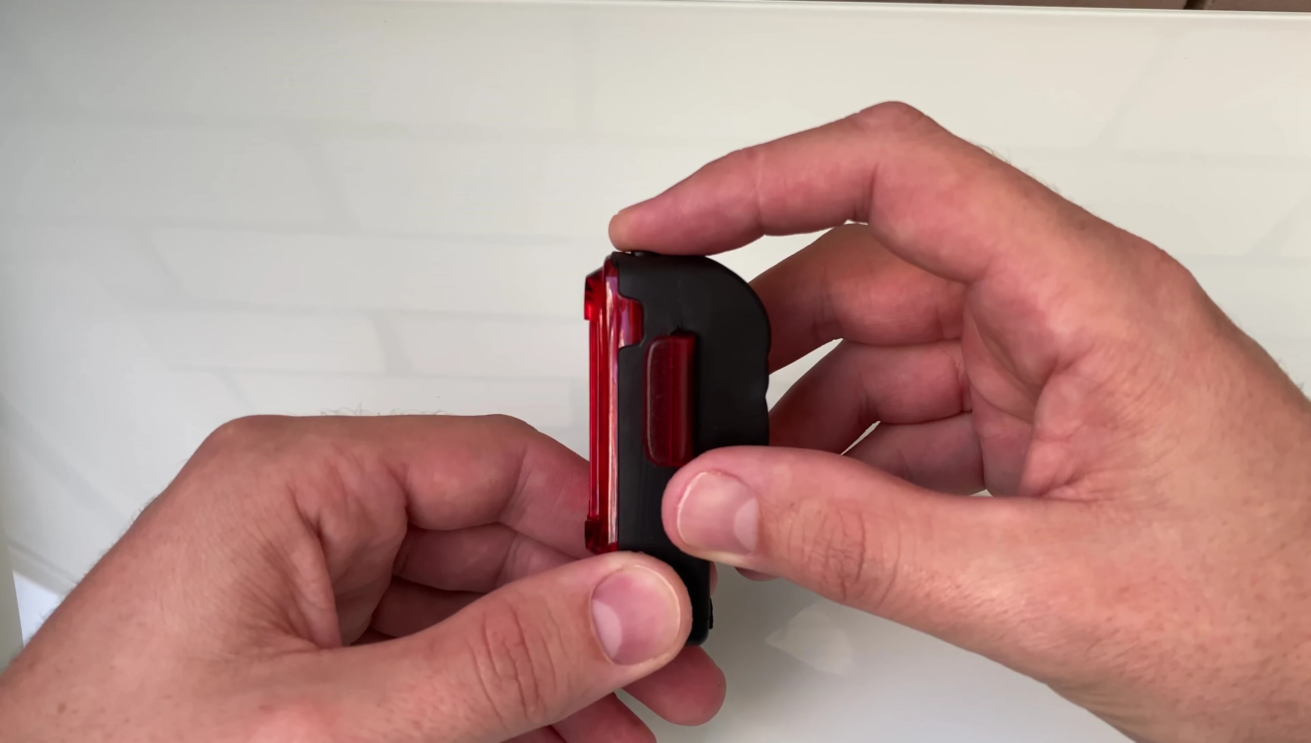 The battery indicator light showcasing its different states of charge.