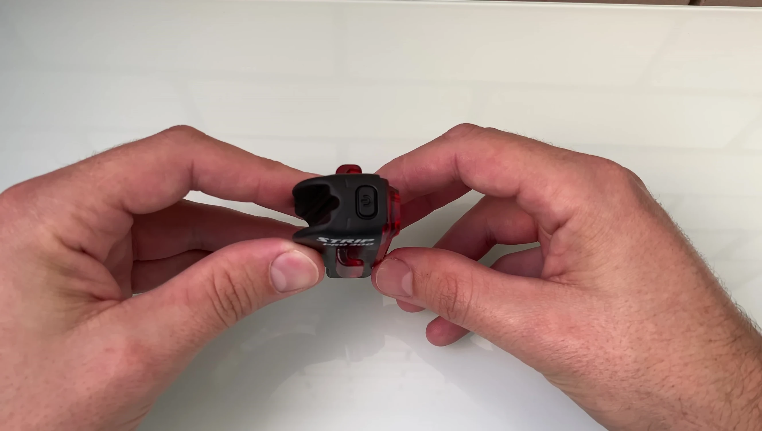 Final shot of the reviewer holding the light.