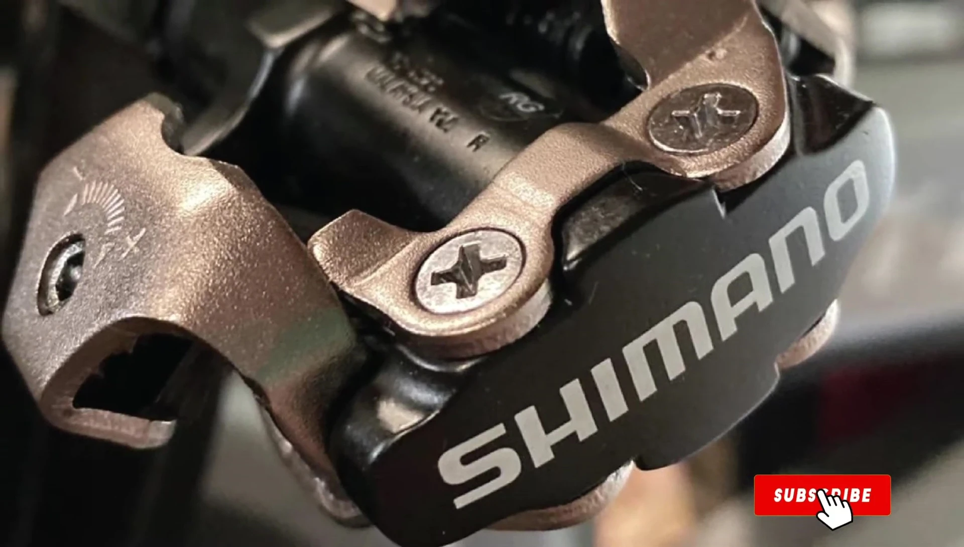 Cyclist easily clipping into Shimano SPD pedals