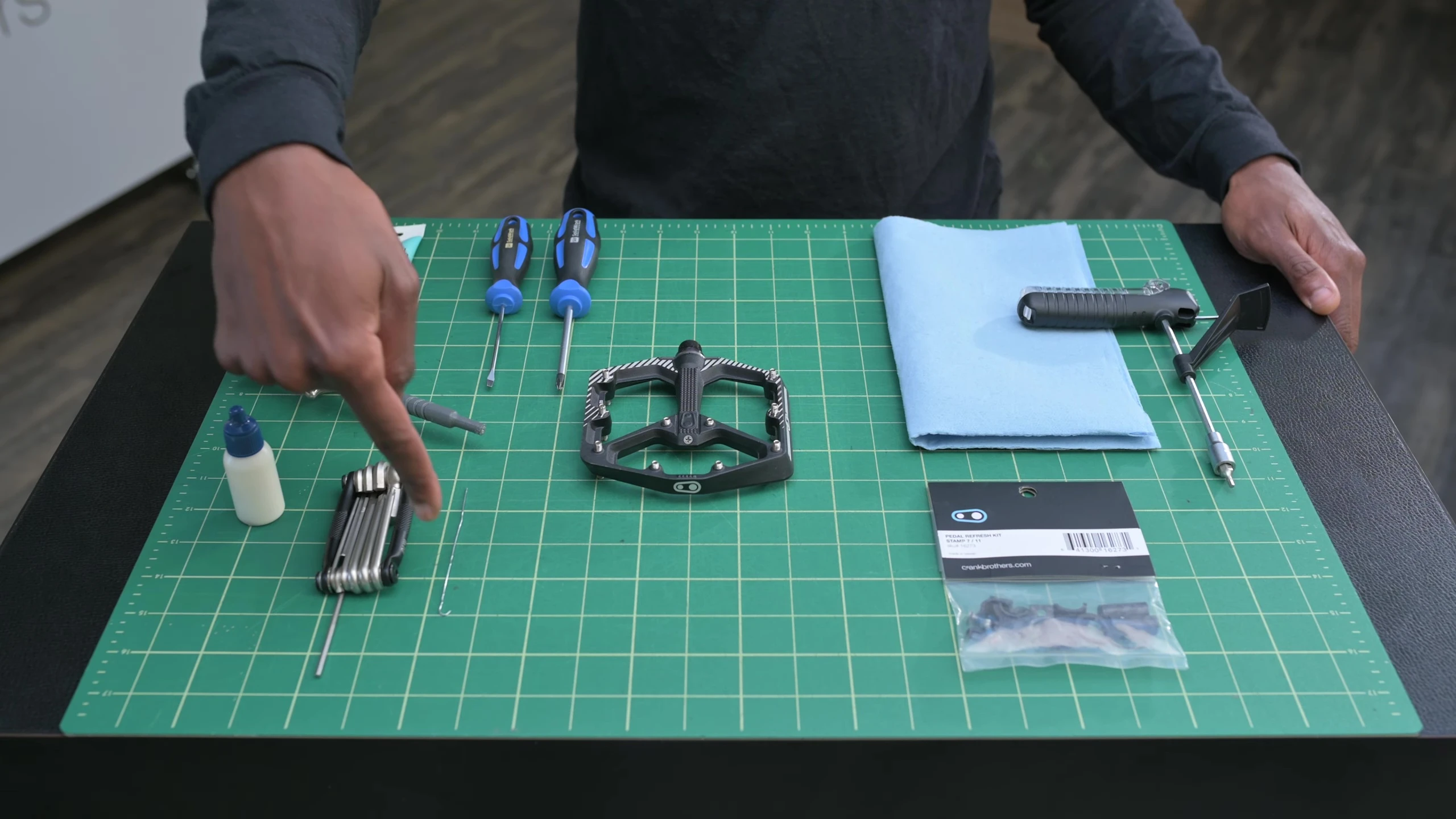 Tools laid out: 2.5mm Allen wrench, paperclip, screwdrivers.