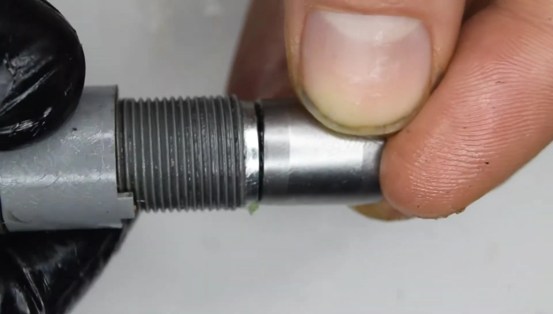 Reinstalling the bearings and plastic components.