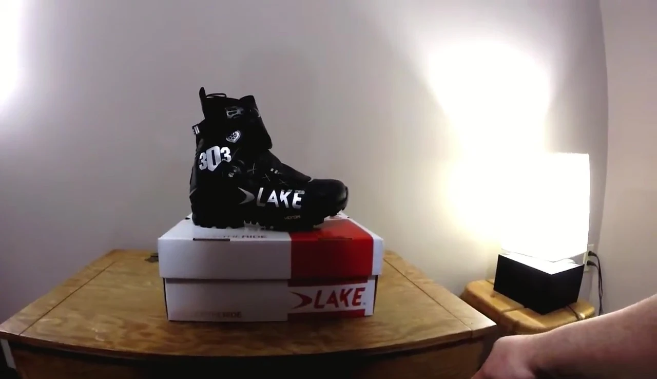 Screenshot of the speaker discussing the use of shoe covers.