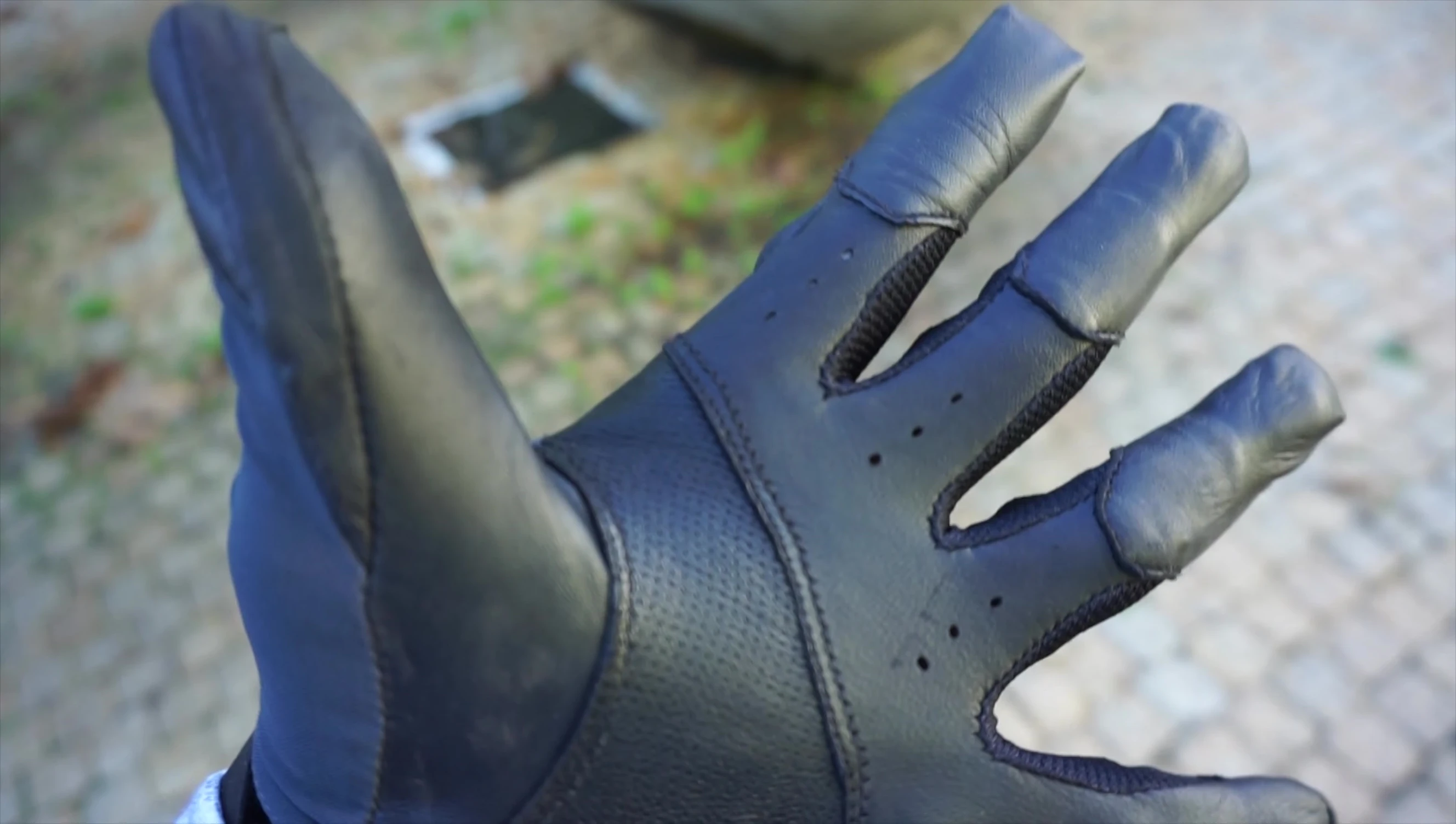 The reviewer discussing the sale price of the gloves.