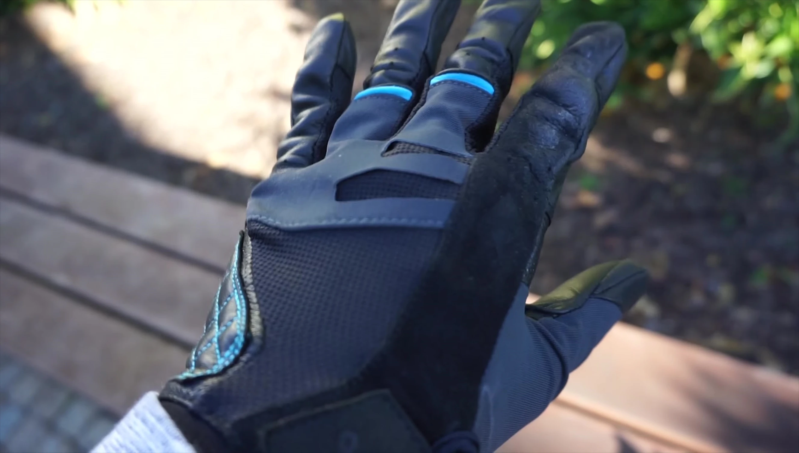 The reviewer showing how well the gloves fit their hands.