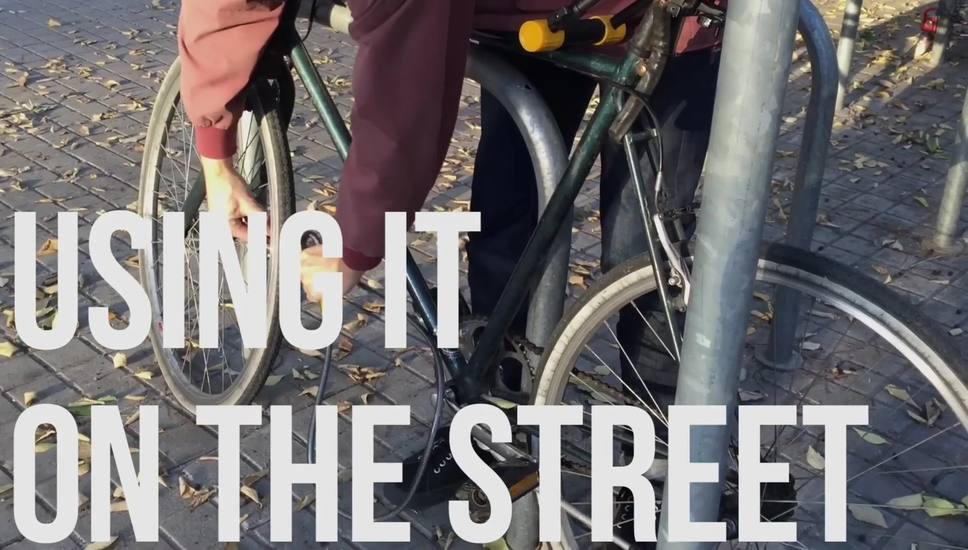 Demonstration of the cable securing the front wheel.