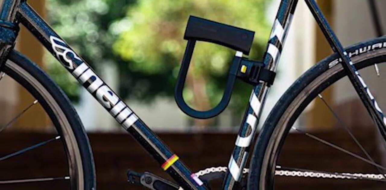 The Pentagon lock shown with its compact size and carry feature.
