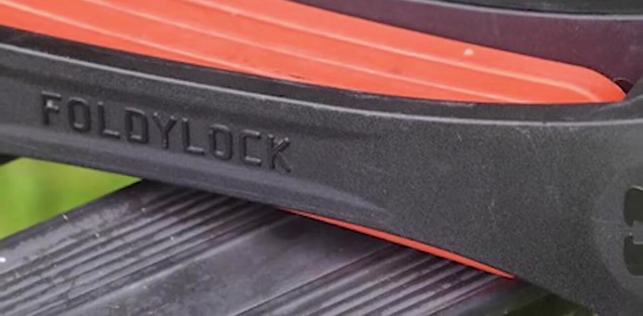 The XPlus 6500 lock easily sliding into its protective case.