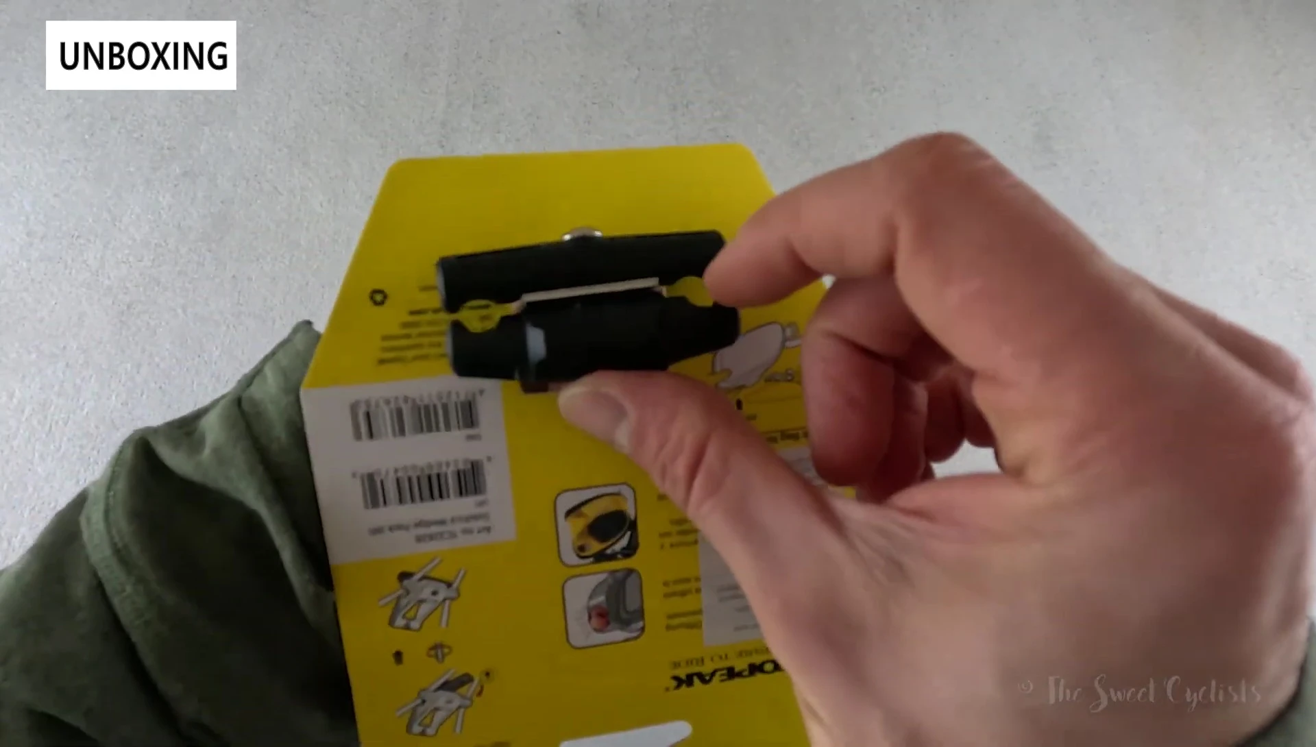 The included bracket attaching to the saddle rails.